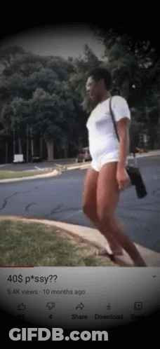 Woman Walking Down Sidewalk With Caption 40 $ P * Ssy ? GIF