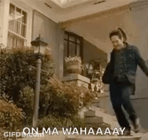 Woman Walking Down Stairs GIF