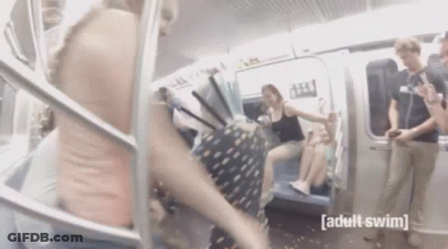 Woman Walking Down Train Stairs GIF