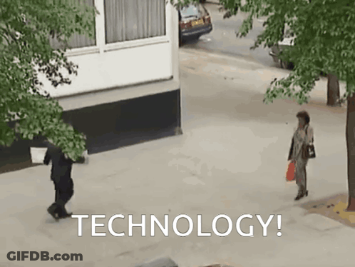 Woman Walking On Sidewalk Saying Technology GIF