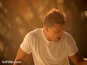 Woman Walking Past Stop Sign GIF