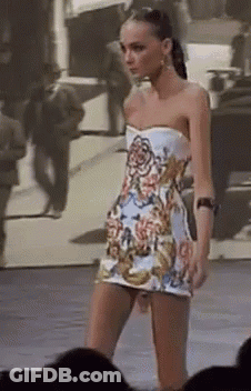 Woman Walking Runway In Strapless Dress GIF