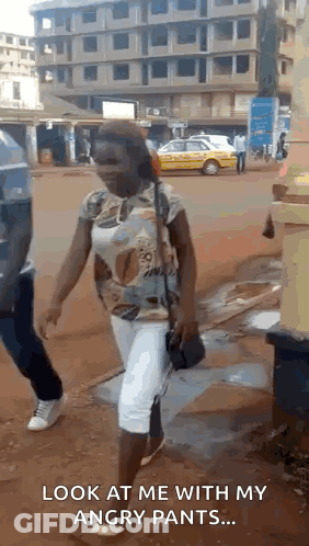Woman Walking Says Look At Me With My Angry Pants GIF