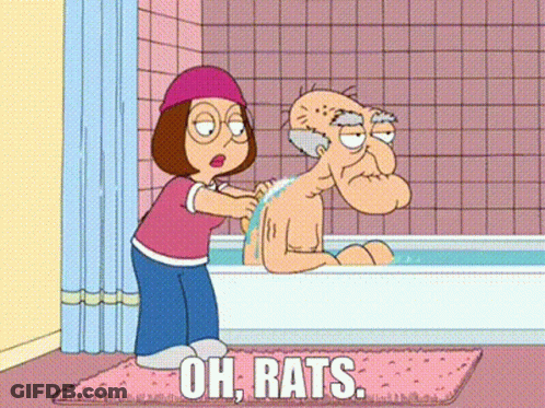 Woman Washing Elderly Man's Back In Bathtub GIF