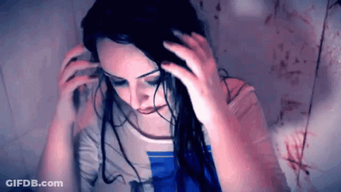 Woman Washing Hair In Blue And White Striped Shirt GIF