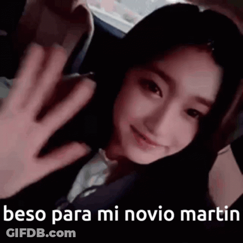 Woman Waving From Car Back Seat GIF