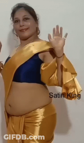 Woman Waving In Yellow Saree And Blue Bra GIF