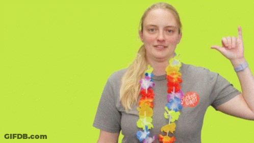 Woman Wearing Aloha Shirt Making Funny Face GIF