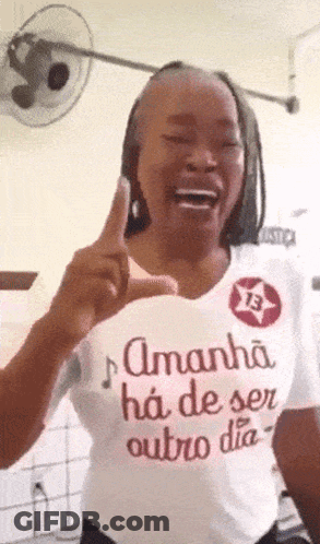 Woman Wearing Amanha Has De Ser Outro Dia Shirt GIF