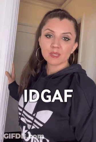 Woman Wearing Black Adidas Hoodie In Doorway GIF