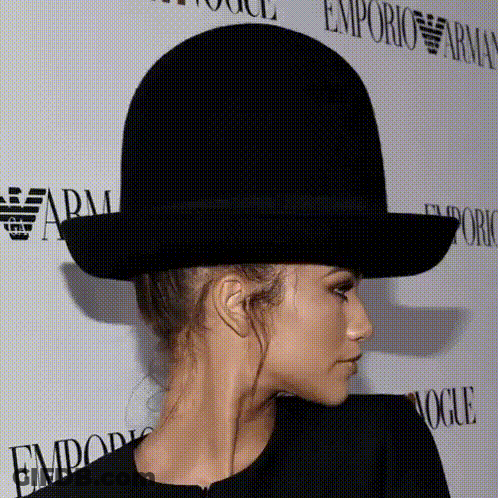 Woman Wearing Black Emporio Armani Hat GIF