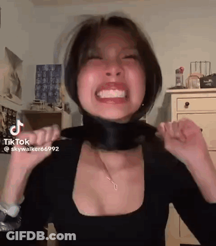Woman Wearing Black Shirt And Black Scarf GIF