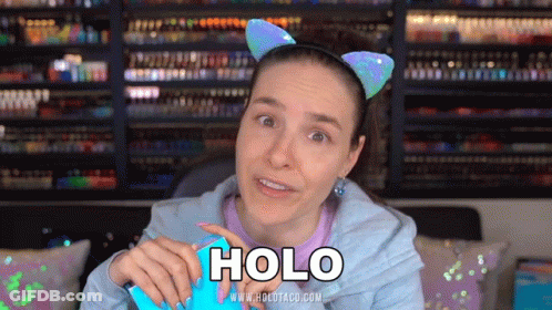 Woman Wearing Cat Ear Headband Saying Holo GIF