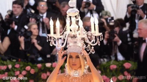 Woman Wearing Chandelier Headpiece GIF
