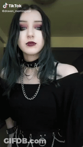 Woman Wearing Choker And Chains GIF