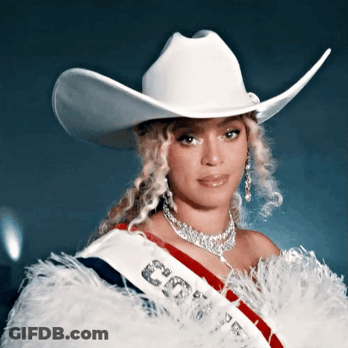 Woman Wearing Cowboy Hat And Sash GIF