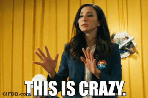 Woman Wearing Crazy Badge GIF