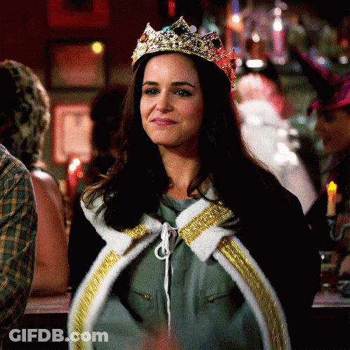 Woman Wearing Crown And Cape Smiling GIF