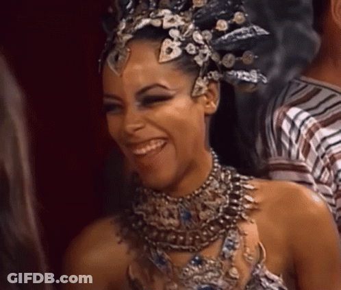 Woman Wearing Crown And Necklace Smiling GIF