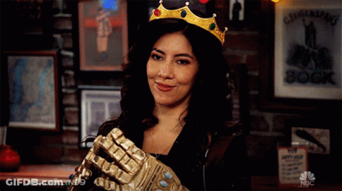 Woman Wearing Crown Holding Brooklyn99 Glove GIF