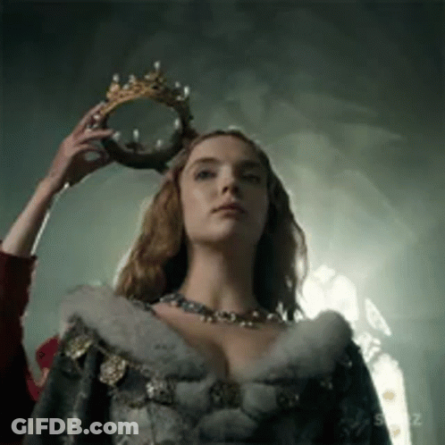 Woman Wearing Crown In Dark Room GIF