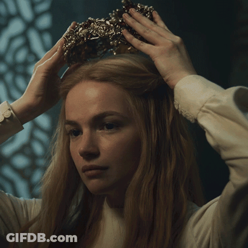 Woman Wearing Crown Looking At Camera GIF