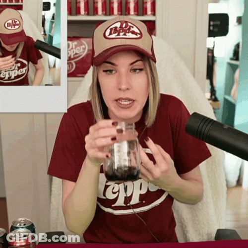 Woman Wearing Dr Pepper Cap And Shirt GIF