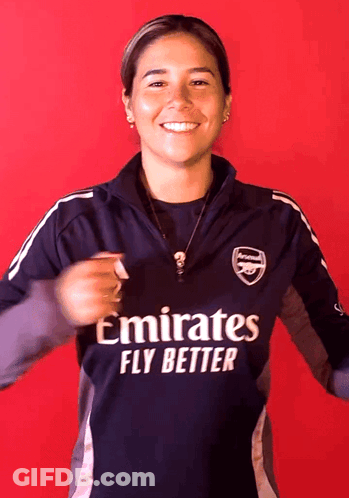 Woman Wearing Emirates Fly Better Shirt GIF