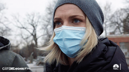 Woman Wearing Face Mask And Beanie With #Chicagofire GIF