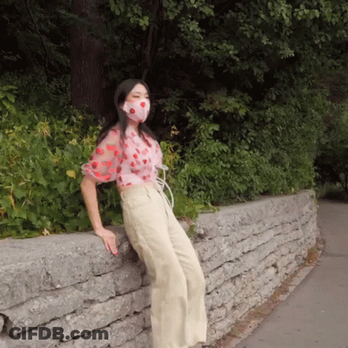 Woman Wearing Face Mask Leaning GIF