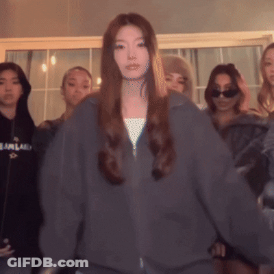 Woman Wearing Fearland Grey Sweatshirt GIF