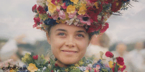 Woman Wearing Flower Wreath GIF