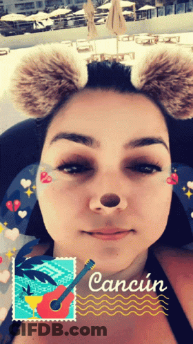 Woman Wearing Furry Ears And Cancun Stamp GIF