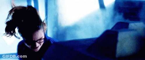 Woman Wearing Glasses And Blue Shirt GIF