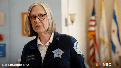 Woman Wearing Glasses And Chicago Police Jacket GIF
