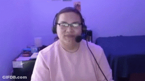Woman Wearing Glasses And Headset Sitting At Desk GIF