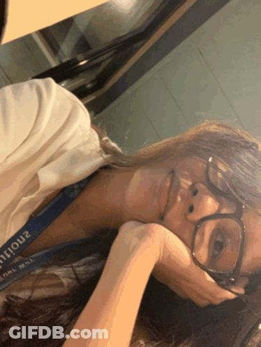 Woman Wearing Glasses And Lanyard 2Ntour GIF