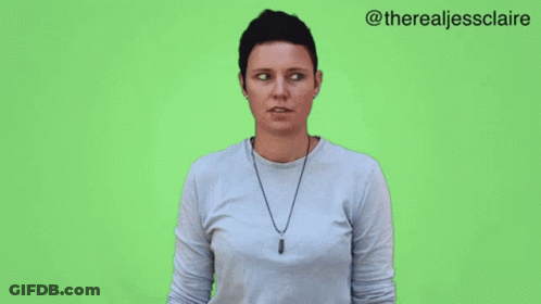 Woman Wearing Glasses And Leopard Shirt Making Funny Face GIF