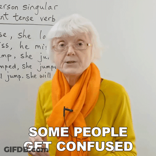 Woman Wearing Glasses And Orange Scarf Says Some People Get Confused GIF