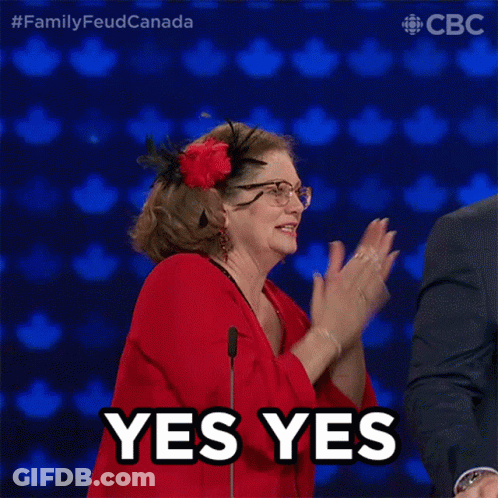 Woman Wearing Glasses And Red Dress Saying Yes GIF