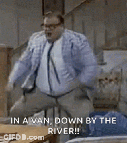 Woman Wearing Glasses And Scarf Saying Wait What GIF