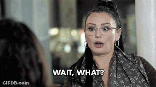 Woman Wearing Glasses And Scarf Saying Wait What GIF