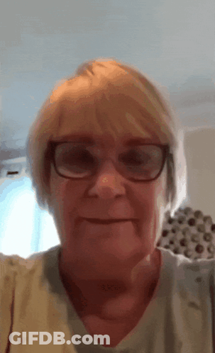 Woman Wearing Glasses And Sweater GIF