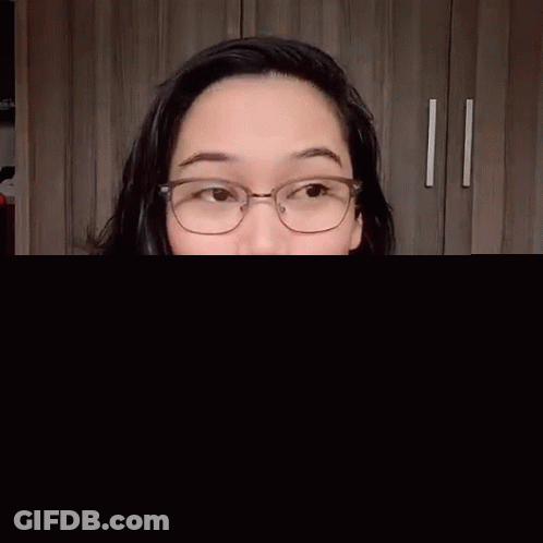 Woman Wearing Glasses And Tan Jacket GIF