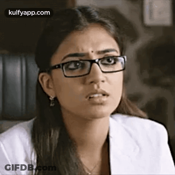 Woman Wearing Glasses And White Coat GIF