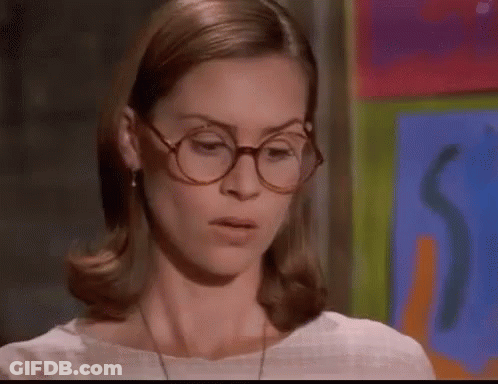 Woman Wearing Glasses And White Shirt GIF