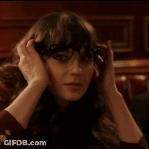 Woman Wearing Glasses Covering Ears GIF