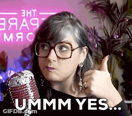 Woman Wearing Glasses Giving Thumbs Up GIF