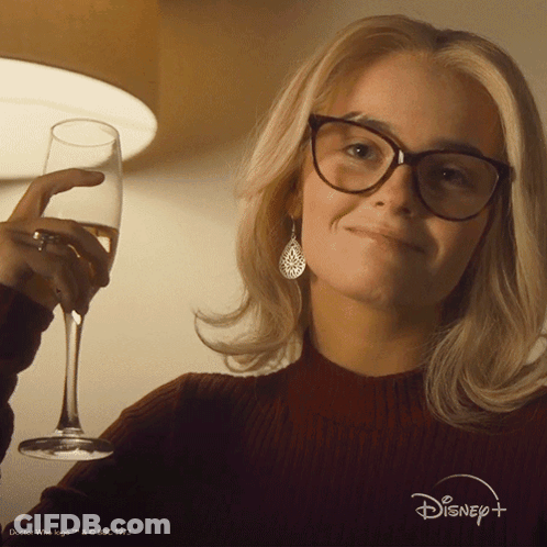 Woman Wearing Glasses Holding Wine GIF
