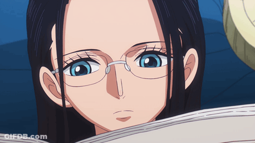 Woman Wearing Glasses Looking At Something GIF